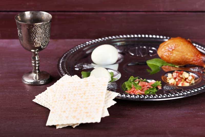 Matzo-for-Passover-with-Seder-meal-with-wine-on-plate-on-table-close-up ...